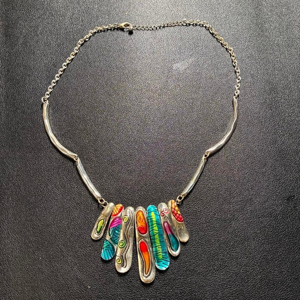 Multi-colored silver tone necklace.